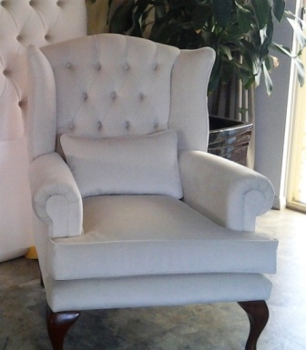 Wing back chair with buttons